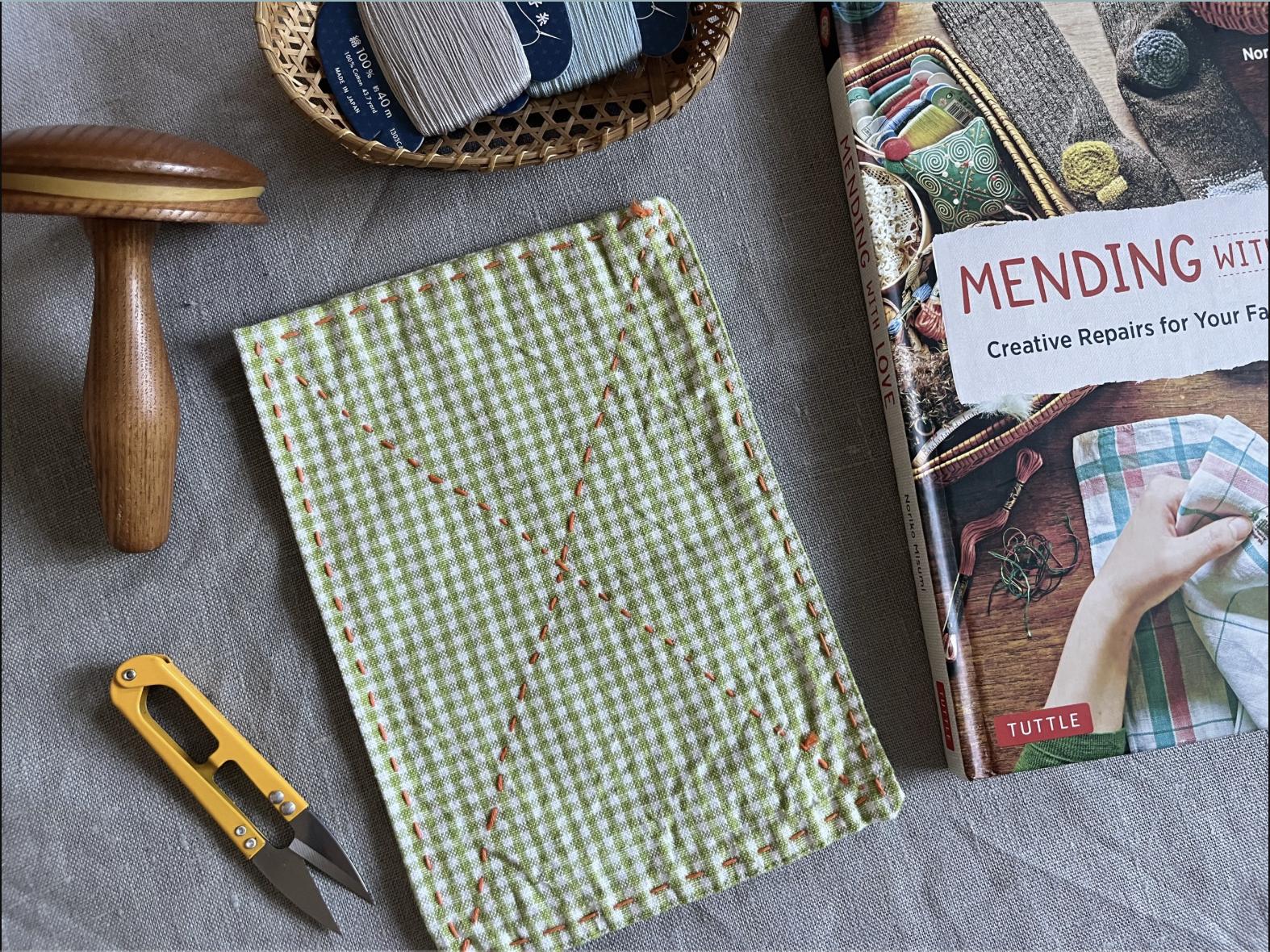 Mending at the Market